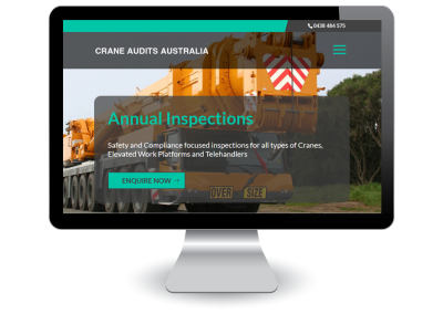 Computer screen displaying the homepage of Crane Audits Australia, featuring a large yellow crane and text about annual inspections. Green Enquire Now button is visible over the image.